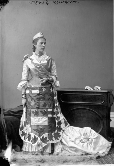 Mrs. St. Denis-Lemoine as The Dominion of Canada. http://collectionscanada.gc.ca/pam_archives/index.php?fuseaction=genitem.displayItem&lang=eng&rec_nbr=3200048